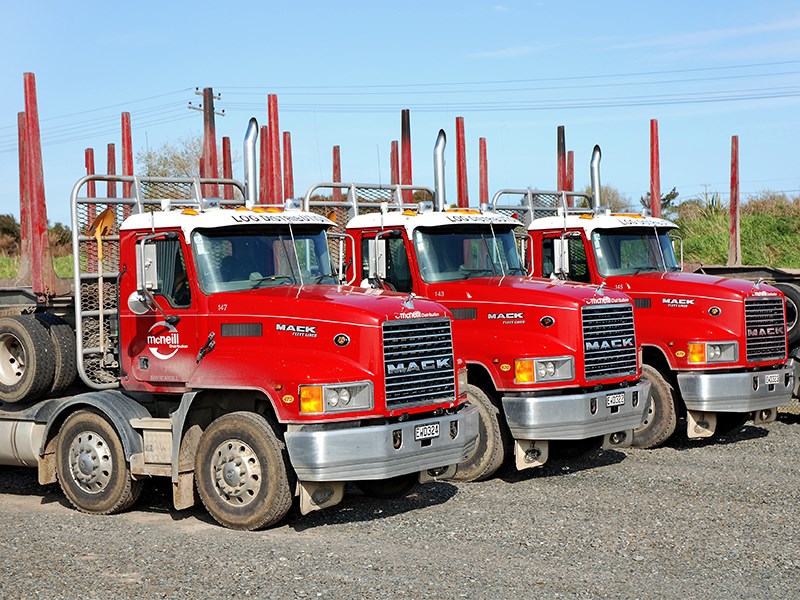 A trio of identical Mack CH loggers with consecutive number plates back in 2010