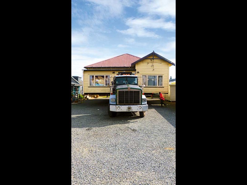 A house being moved in the CWBR yard