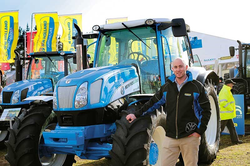 Josh Vroombout with the classic looking New Holland T6070 PLus
