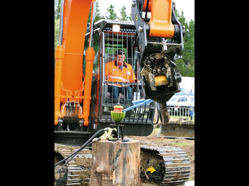 Craig Crowley of Whakatane sucessfully peeling a watermelon as part of the National Excavator Operator competition