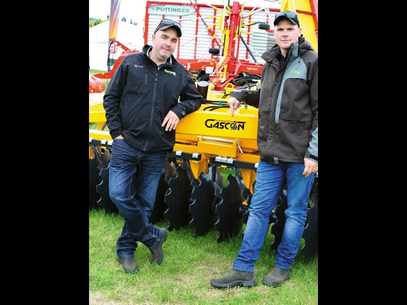 Farm Trader s Brent Lilley and Jaiden Drought checking out new gear at Southern Field Days