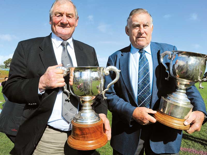 Farmers and their roles in rugby Brian Lochore and Colin Meads holding the Lochore and Meads Cups