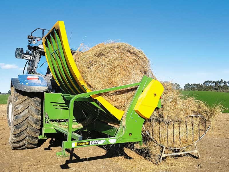 Feeding into hay racks with Hustler