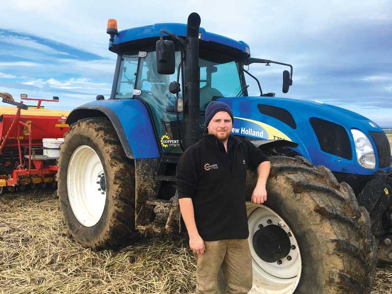 Young Farmer Phillip Hopkins uses contracting to see the world