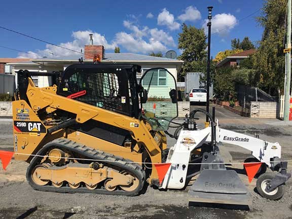 Cat skid steer loader with EasyGrade attachment