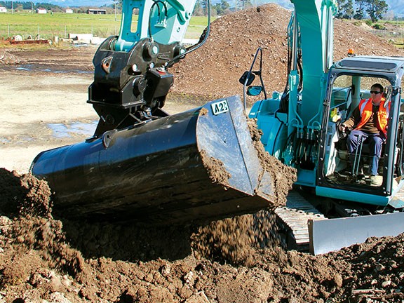 Putting the Attach2 Elite tilt bucket to work on a new Kobelco excavator.