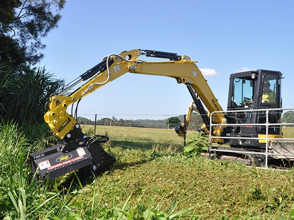 A Digga flail mower attached to a light excavator.