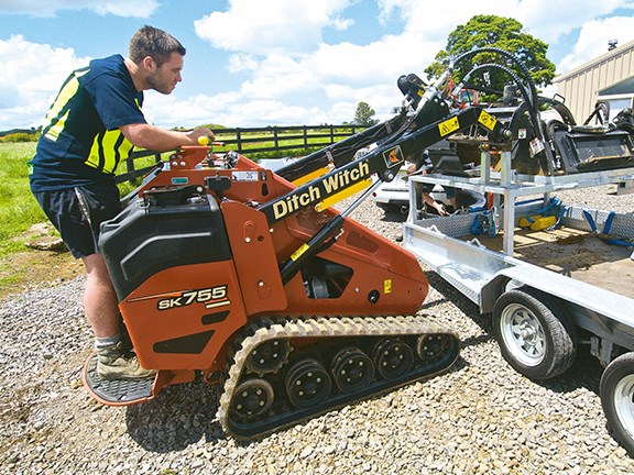 The trailer is designed to make changing the Ditch Witch SK755’s attachments relatively easy.