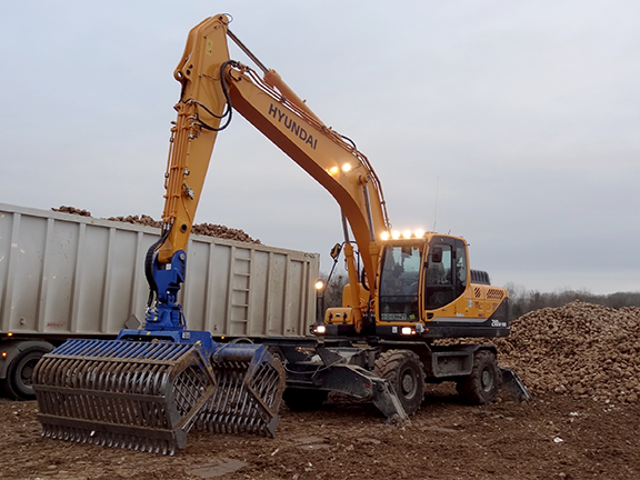 The Hyundai R210W-9A wheeled excavator loading sugar beet in France.
