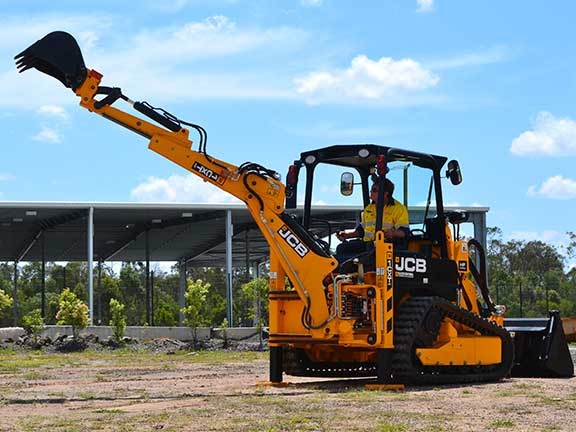 JCB 1CXT backhoe loader with dipping arm extended