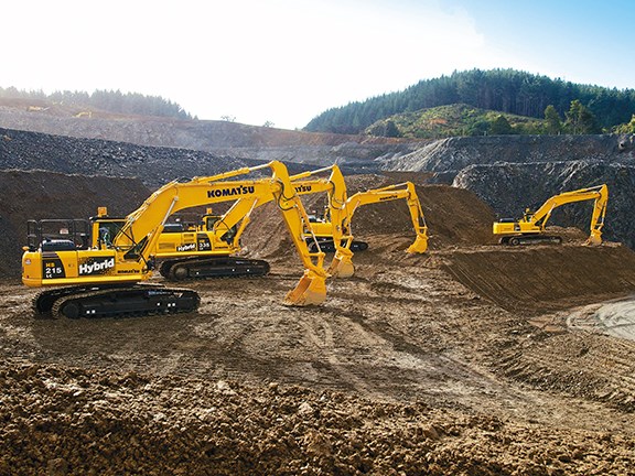 A lineup of talented Komatsu earthmovers, including the HB215LC-1 and HB335LC hybrids.
