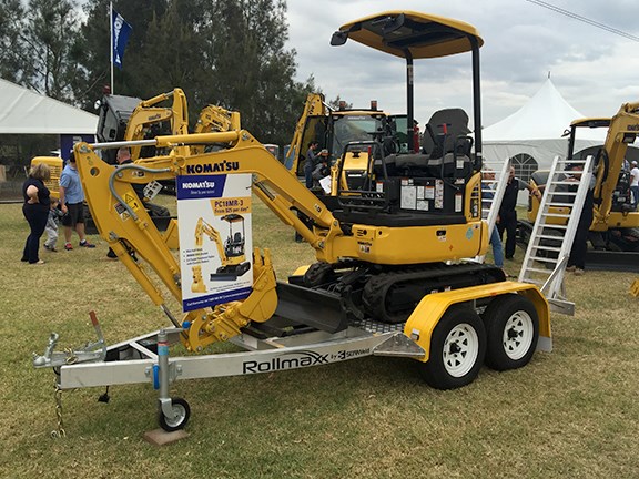 Komatsu was showing off a tradie deal on its PC18MR-3 mini excavator — digger, KGA half hitch, 300mm KGA bucket and 2.4-tonne Sureweld trailer from $25 a day.