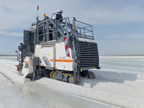 The Wirtgen Surface Miner 2200 SM is equipped with a 3.8m-wide cutting drum unit and deposits the salt in a windrow, ready for loading.