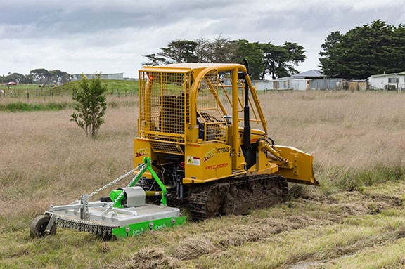 The East Wind compact dozer towing a 1.2m slasher