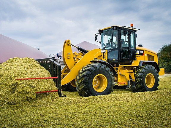 Buying the right ag attachments can turn an earthmover into a willing farm-hand.