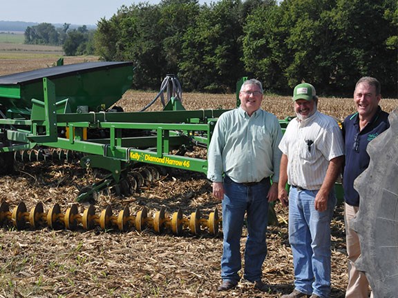 The new Diamond Harrow model and Cover Crop Feeder with (left to right) US Sales and Marketing Manager Wayne Rosenbaum, Kelly dealer and farmer George Quinn and Kelly Engineering Managing Director Shane Kelly