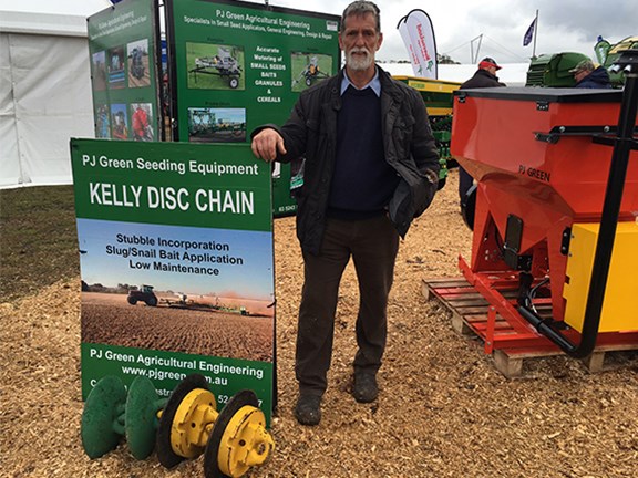 Harry Green alongside the Kelly Disc Chain, which he helped to develop.