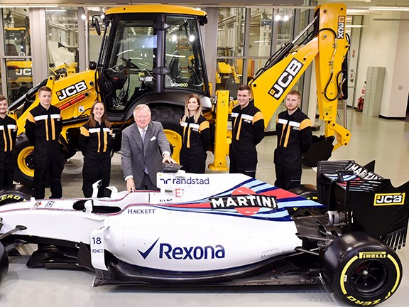 Lord Bamford, some of his team, and the Williams Martini F1 car