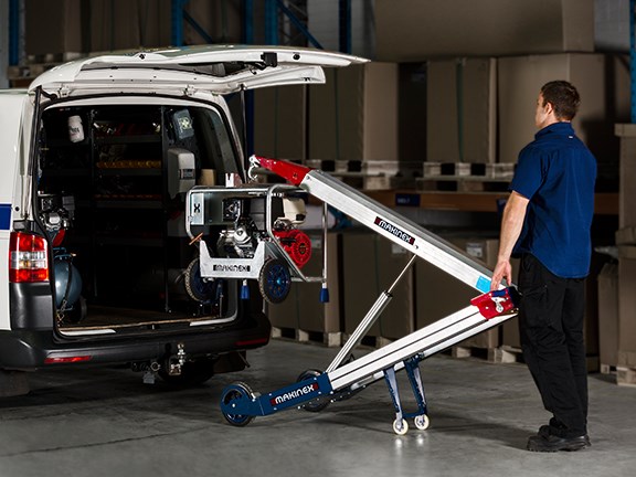 The Makinex powered hand truck allows a single person to load heavy equipment