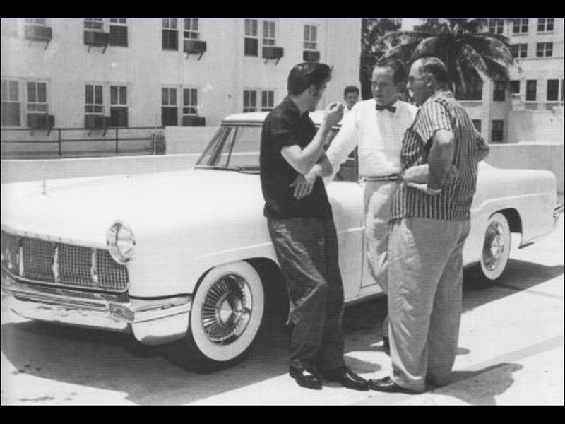 Elvis Presley and his 1956 Lincoln Continental Mark II 