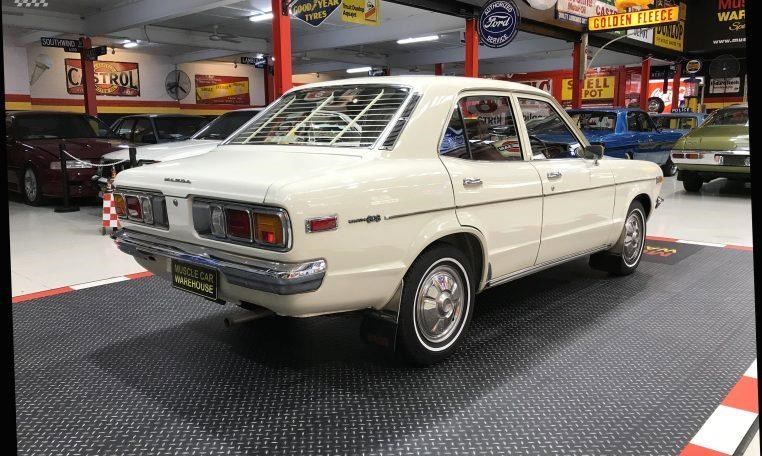 Mazda 808 rear side