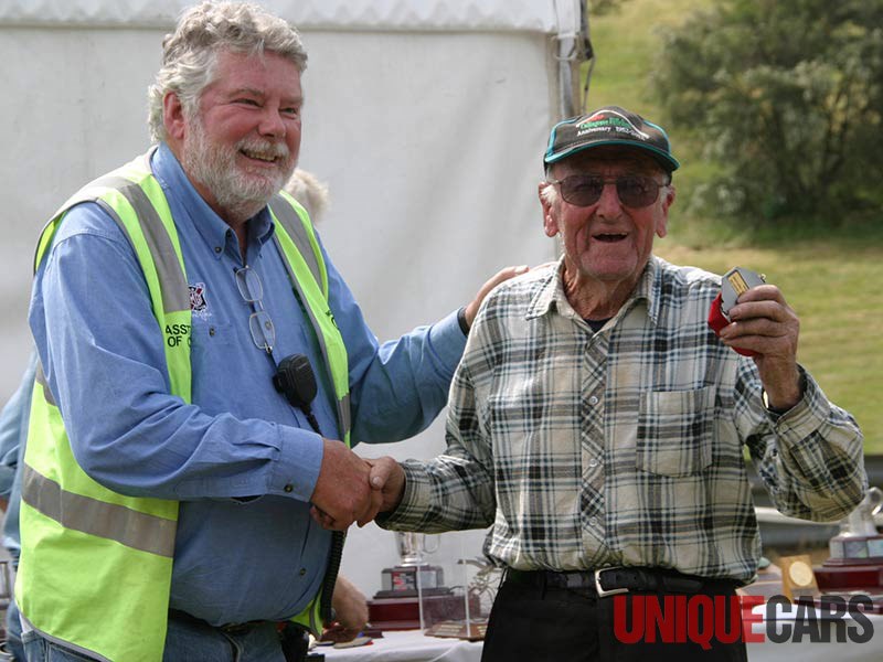 Trevor Cole receiving his trophy