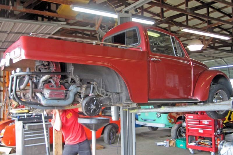 Volkswagen beetle pickup on hoist