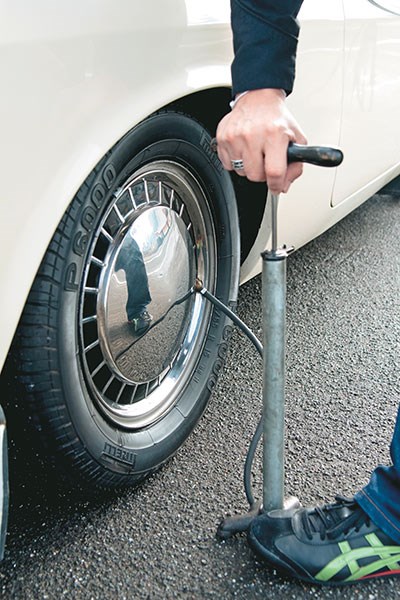 Original wheel trims and pump came with the car