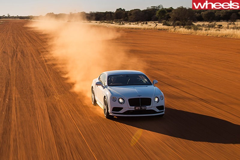 bentley driving dirt road