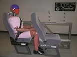 A crash test dummy sits in the popular Transport Seating Safe-t-Ride low back coach seat, designed by industry identity Rod Ferguson for school and charter buses