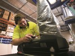 A KAB technician fine tunes a GSX 3000 driver’s seat prior to shipping
