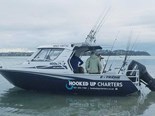 On-board a fishing charter in Auckland