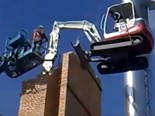 Video: Mini-excavator just hangin' around