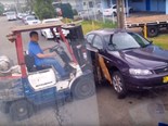 Video: Idiots moving parked car with forklift