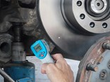 Using a heat gun can save a technician time when checking for brake wear
