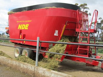 NDE vertical feed mixer cuts waste