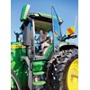 Amy and Ritchie Cudby try the massive John Deere 7R for size