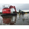 Sumitomo SH235 LCR excavator in water