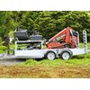 One trailer is all that was needed for the SK755 loader and its attachments.