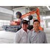 TradeEarthmovers.com.au reviewer Ron Horner and Anhui Hekuang Machinery  (Heking) CEO Hu Qian Gui at the Heking factory in China.