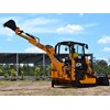JCB 1CXT backhoe loader with dipping arm extended