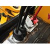 Detail showing the JCB 3CX backhoe loader stick attached to the JCB 8025 ZTS slew foot control.