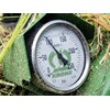 A pressure gauge clearly shows the degree of downward pressure on the mowers.