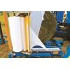 Net Film The three roller tensioners on the wrapping heads ensure even tightly wrapped bales