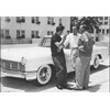 Elvis Presley and his 1956 Lincoln Continental Mark II 