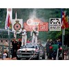 Auriol sprays the champagne at the 1990 Monte Carlo Rally