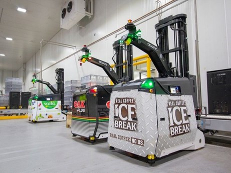 Three of the four AGVs installed at Lactalis’ Lidcombe milk site in Sydney