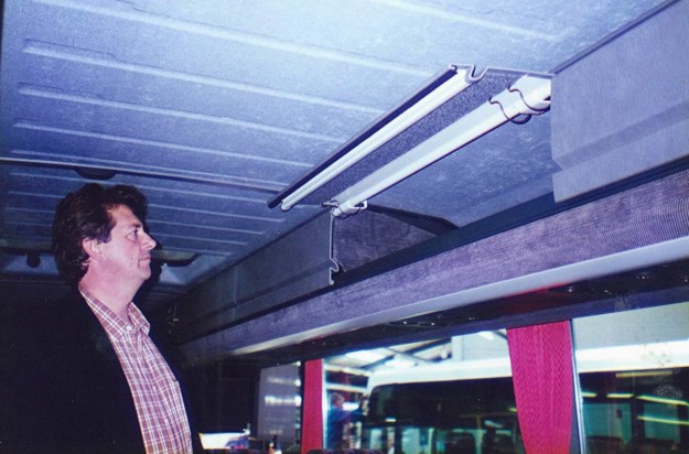 Ray - Old Image Inspecting Bus.jpg