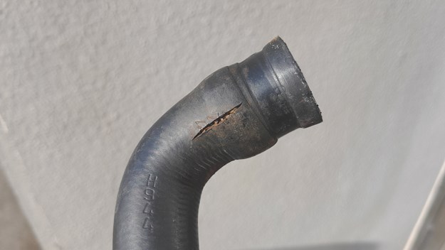 Heater hose, complete with crack..jpg