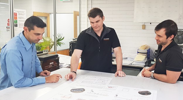 Manufacturing Engineering Leader Brenton McCallum centre.jpg